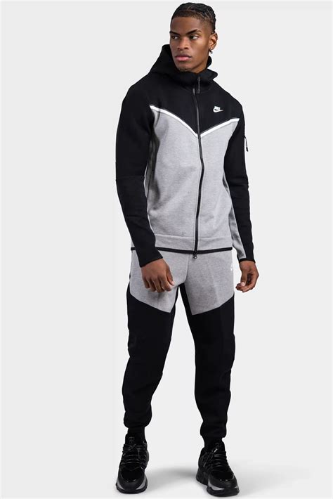 nike tech grijs trainingspak|Nike grey trainingspak.